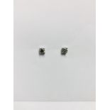 0.30ct Solitaire diamond stud earrings set with brilliant cut diamonds, SI2 clarity and I colour.