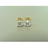 1.40ct Diamond solitaire earrings set with brilliant cut diamonds, I colour I1 clarity. Four claw