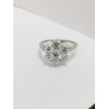 2.25ct diamond cluster style dress ring. 7 Brilliant cut diamonds, I colour and si2-3 clarity.