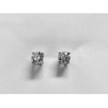 1.50ct diamond solitaire earrings set in 18ct white gold. 2 x brilliant cut diamonds, I colour and