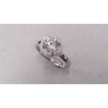 1.04ct diamond set soliatire ring in platinum. H colour and I1 clarity. Halo setting small