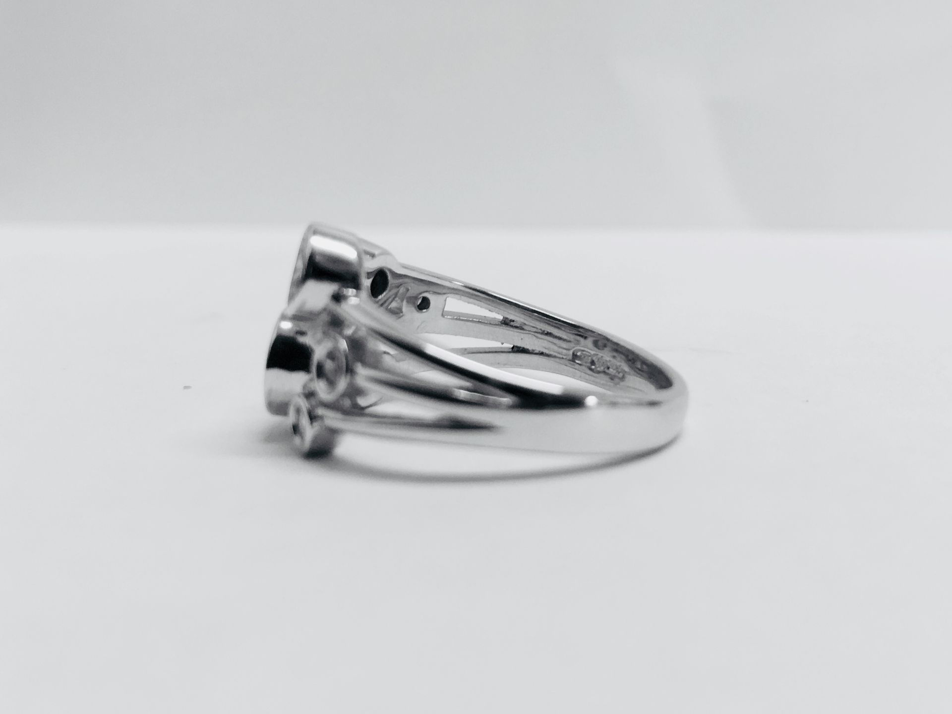 1.00ct 9ct white gold diamond dress ring, rain dance style. Set with 7 graduated brilliant cut - Image 3 of 3