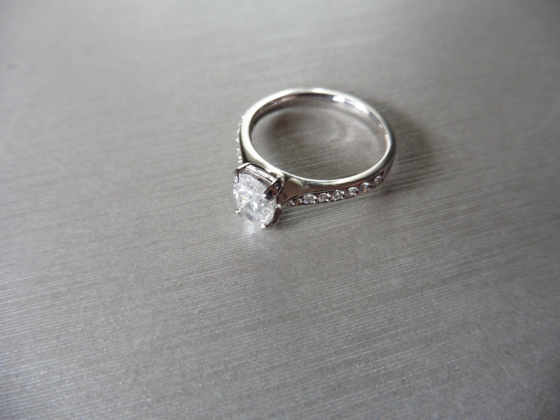 1.03ct Oval Diamond,i colour si3 clarity,18ct white gold setting,diamond set sides,h colour si2 - Image 3 of 4