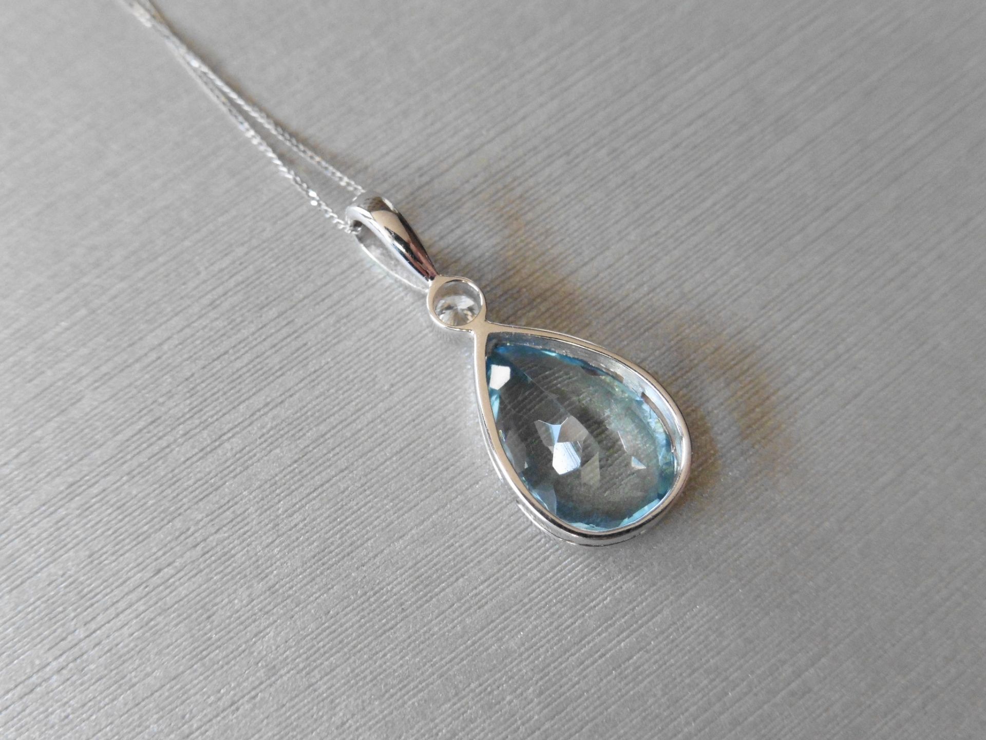 18ct white gold Aquamarine and diamond pendant,3.09ct Brazilian aquamarine 13mm x9mm x4.7mm ,0. - Image 4 of 4