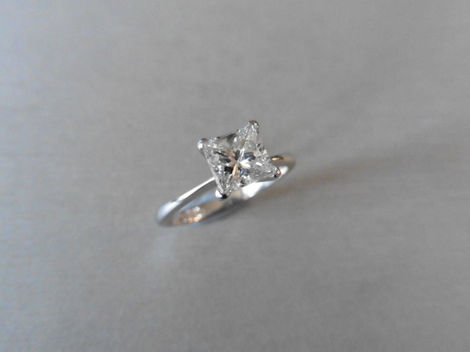 0.98ct diamond solitaire ring with a princess cut diamond. i colour and i1 clarity. Set in 18ct gold