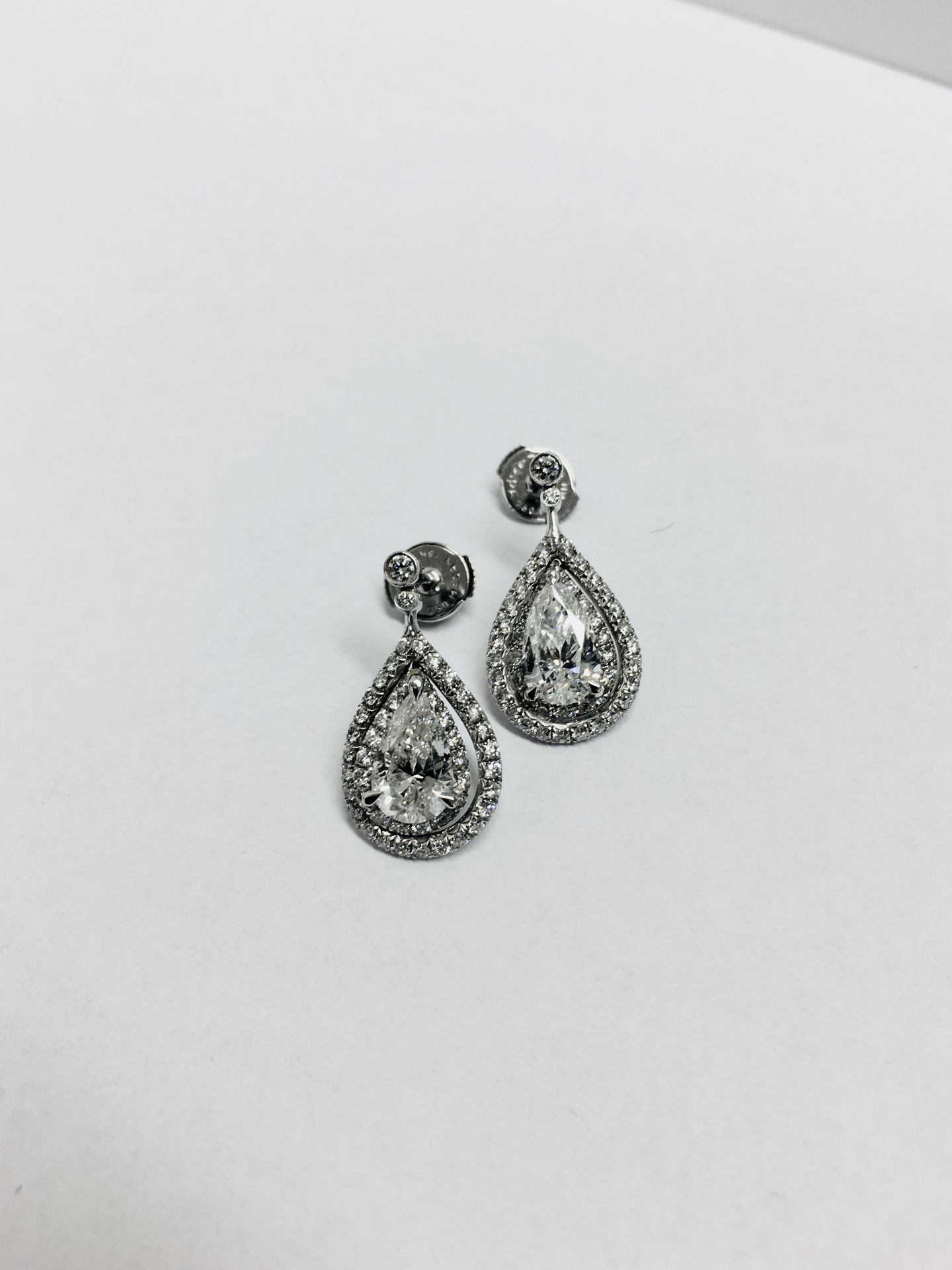 2.04ct diamond drop earrings. Each set with a certificated pear shaped diamond with a halo - Bild 6 aus 6