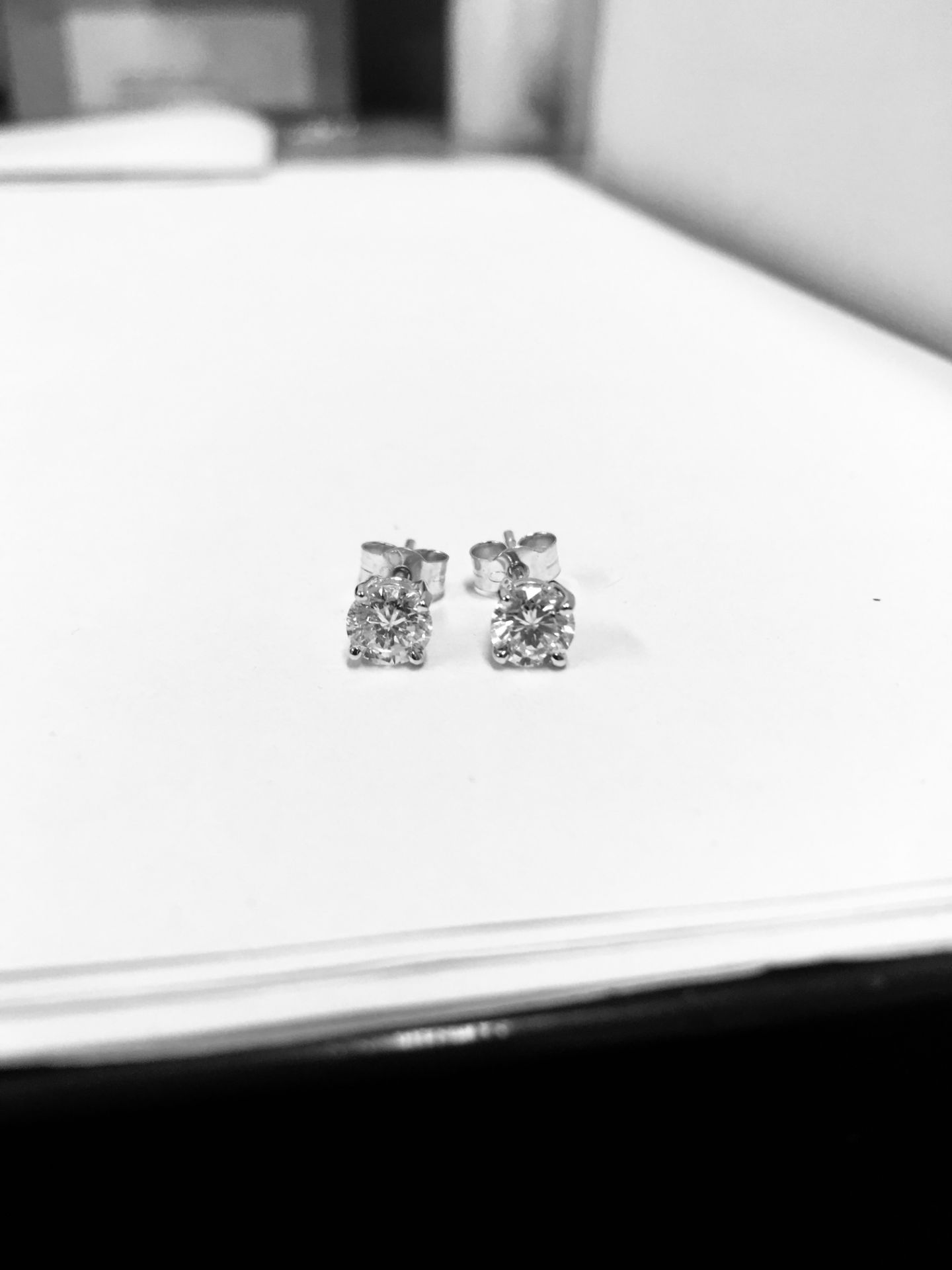 2.00ct Diamond solitaire earrings set with brilliant cut diamonds, H colour I1 clarity. Four claw