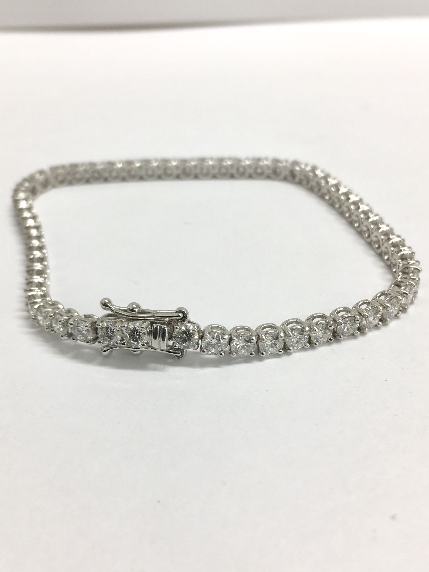 6.60ct Diamond tennis bracelet set with brilliant cut diamonds of I/J colour, si2 clarity. All set