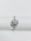 18ct white gold Halo diamond ring,0.50ct centre s2 i colour natural diamond,0.24ct small diamonds,