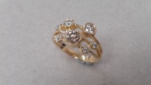 1.00ct diamond dress ring set in 9ct yellow gold. Graduated brilliant cut diamonds, I/J colour and