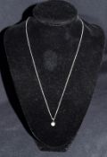18ct White Gold chain with pendant containing good quality .50 brilliant cut diamond.