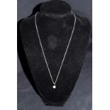 18ct White Gold chain with pendant containing good quality .50 brilliant cut diamond.