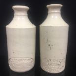 Pair antique Welsh stoneware chemist bottles - J P Richards Druggist Carmarthen