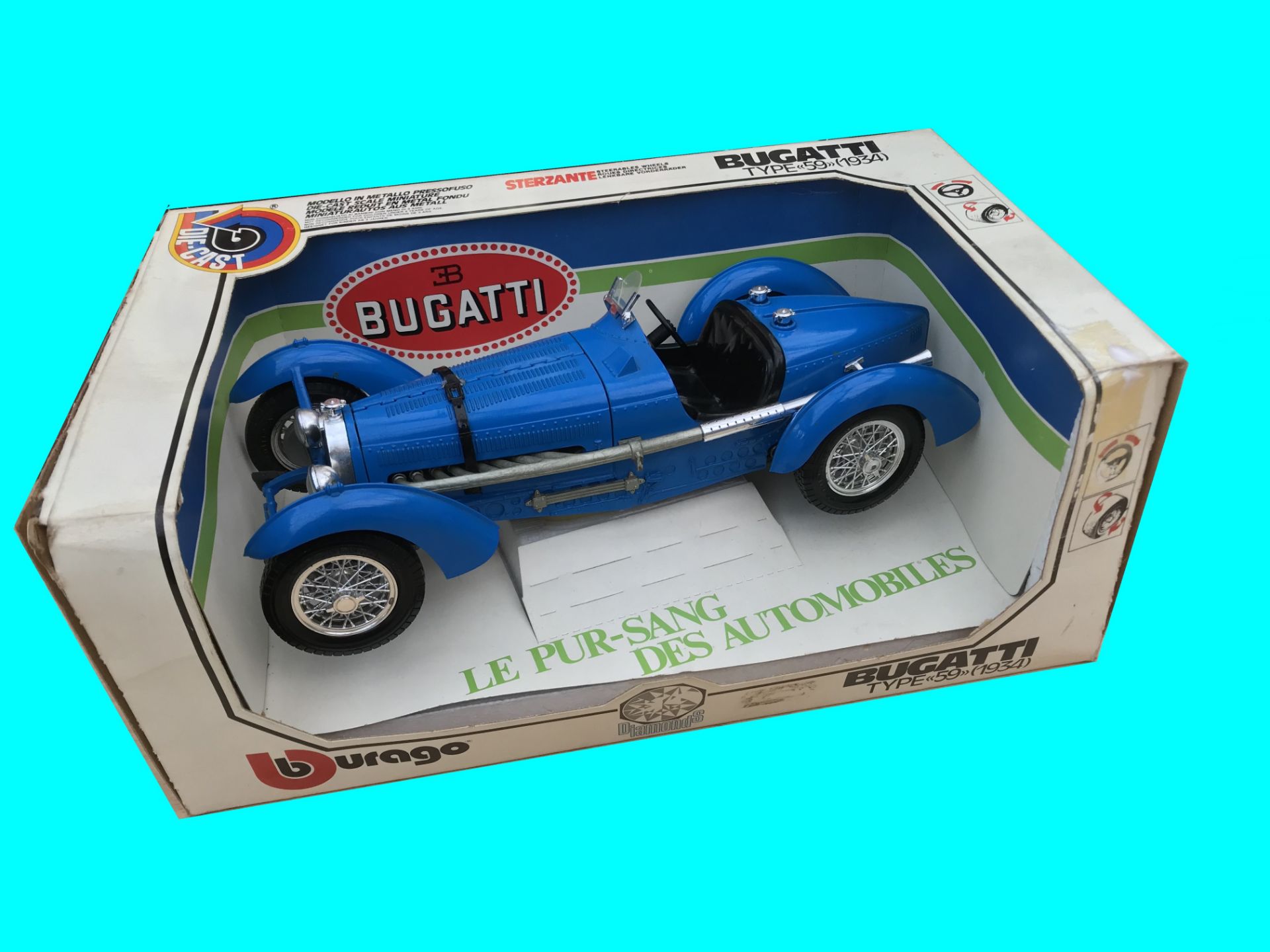 Burago Bugatti Type 59 1934 in a Windowless Box Blue Bugatti Mounted on a plinth in the original box