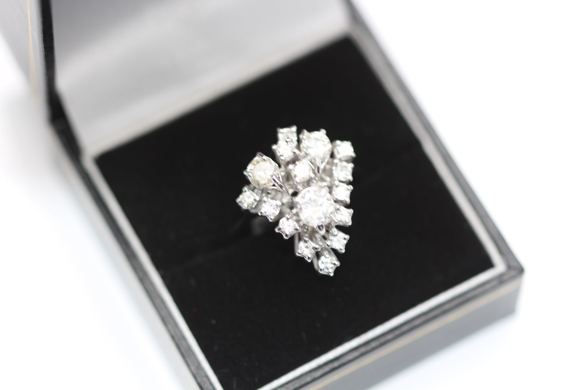 White gold Ladies diamond cluster ring, set with 1.50 carats of brilliant cut diamond solitaires,