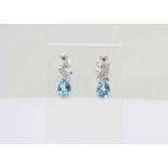 UNUSED - Certified by GIE 9ct White Gold Diamond And Blue Topaz Earring 0.01 Carats, Colour-D,