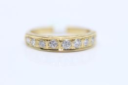 18ct Yellow gold Half Eternity ring, set with nine brilliant cut diamond solitaires, total diamond