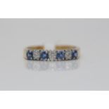 18ct Yelllow Gold Diamond and Sapphire Ring, Set with three brilliant cut diamond solitaires and