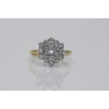 18ct Yellow Gold Ladies diamond cluster ring, set with 19 brilliant cut diamond solitaires, Approx