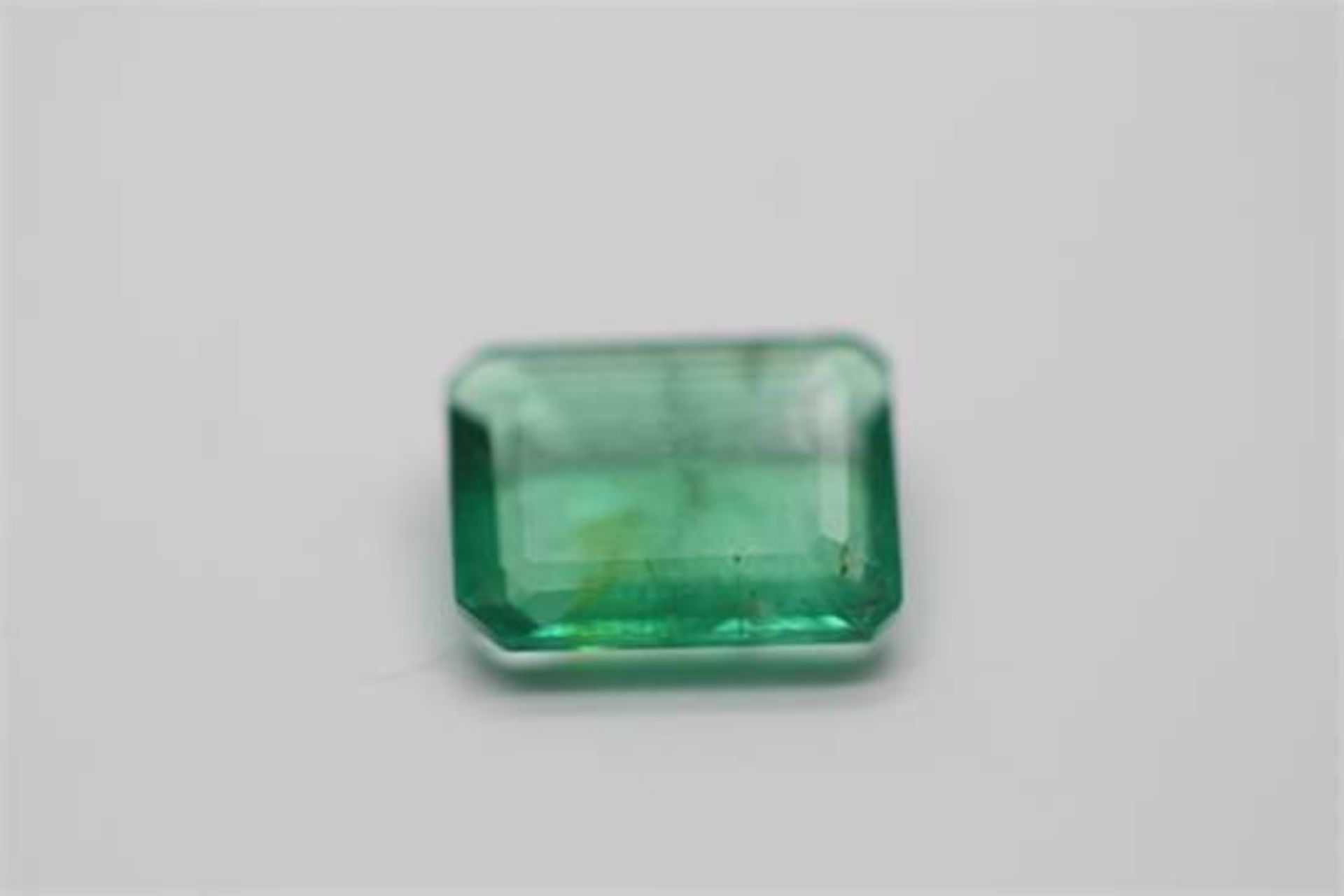 AGI Certified - 0.79 carat Natural Emerald - Emerald Cut.