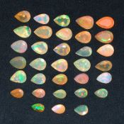 17.00 Carats / 33 Pieces ~ IGL&I Certified ~ Natural Facetted Ethiopian Welo Opals.