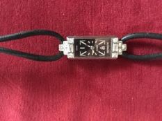 Ladies 1930’s black dial baguette and round diamond Jaeger LeCoultre watch