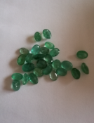A Stunning Collection Of 26 Emeralds. Excellent Cut, Oval Shape In Medium Greens