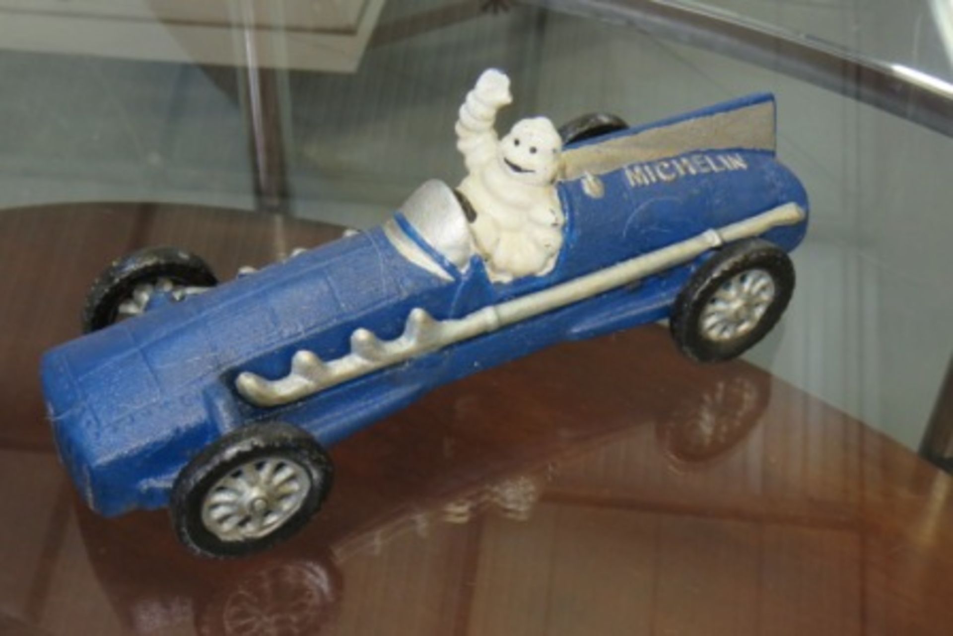 Cast Metal Michelin Man In Racing Car