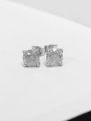 2.02ct Solitaire diamond stud earrings set with brilliant cut diamonds. I colour, I1-2 clarity Set