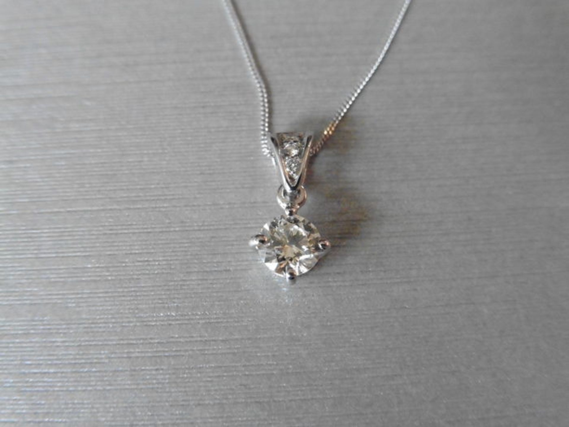 0.40ct diamond set pendant. Brilliant cut diamond, I colour and si3 clarity. The bale is set with