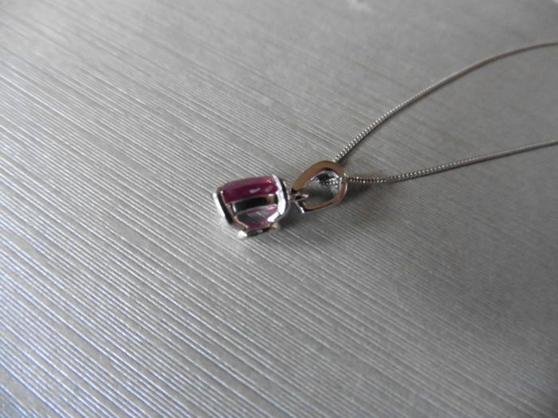 2.40ct ruby and diamond pendant with an 9x7mm oval cut ruby ( fracture treated ) and a diamond set - Image 2 of 2