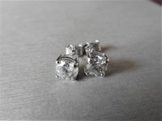 1.40ct Solitaire diamond stud earrings set with brilliant cut diamonds. I colour, I1 clarity Set