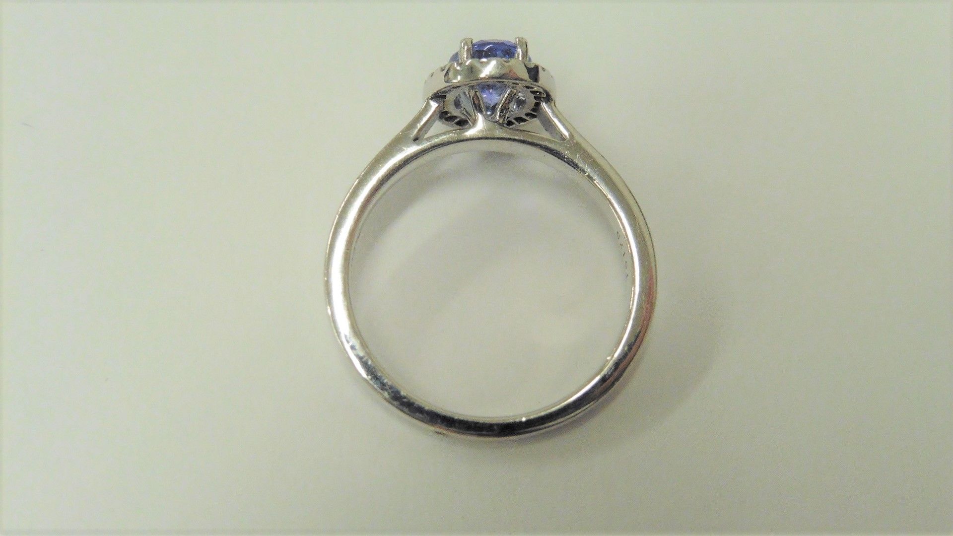 Tanzanite and Diamond cluster ring set in platinum. Oval cut tanzanite ( treated ) 1ct, surrounded - Image 3 of 3
