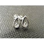 0.20ct diamond earrings set in platinum 950. 2 small brilliant cut diamonds, H/I colourand si2