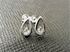 0.20ct diamond earrings set in platinum 950. 2 small brilliant cut diamonds, H/I colourand si2