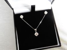 0.35ct / 0.70ct diamond pendant and earring set in platinum. Pendant - 0.35ct brilliant cut diamond,