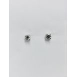 0.50ct diamond solitaire stud earrings set in platinum. I/J colour, si2 clarity.4 claw setting