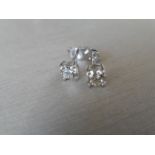0.80ct diamond solitaire stud earrings set in platinum. I/J colour, si2 clarity.4 claw setting