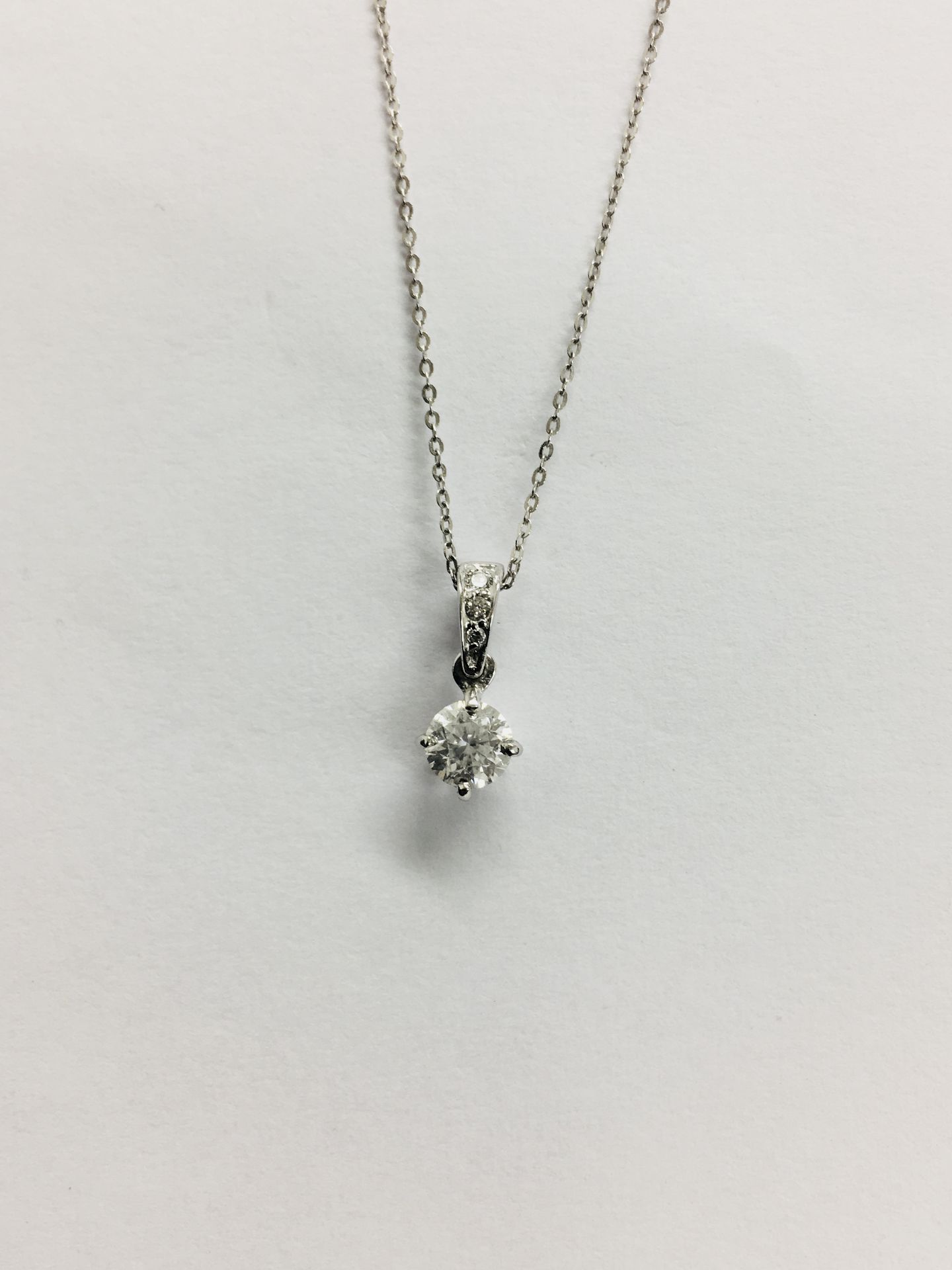 0.25ct diamond set pendant. Brilliant cut diamond, I colour and si3 clarity. The bale is set with