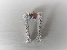 0.60ct diamond drop earrings in platinum. 8 brilliant cut diamonds, I colour, si3 clarity.