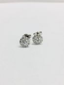 9ct diamond set halo style earrings,0.50ct total brilliant cut diamonds si2 i colour,9ct settings