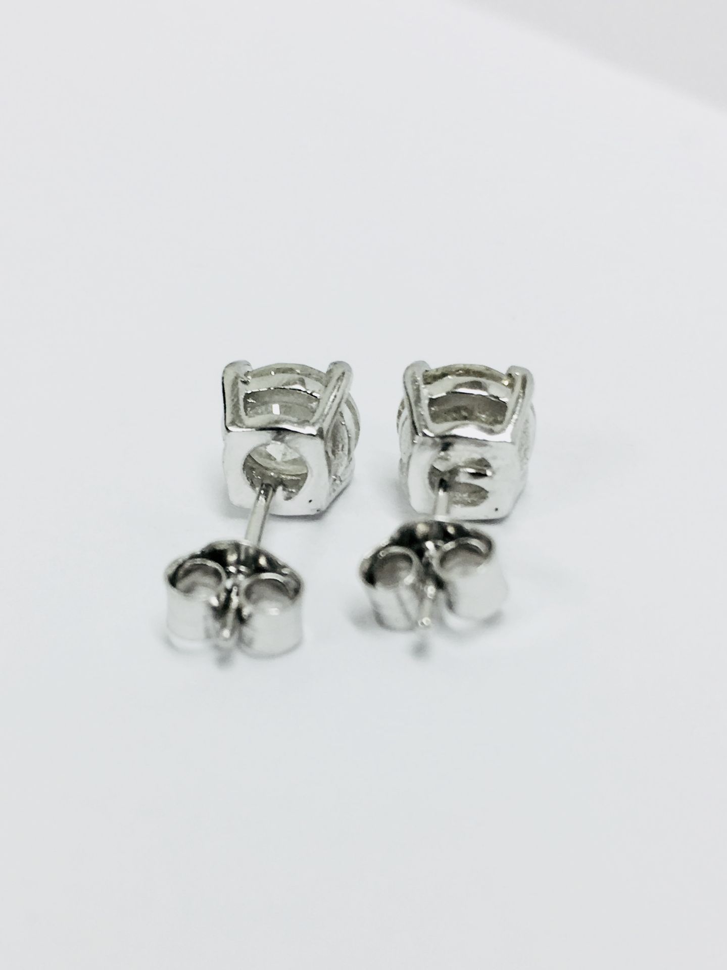 2.00ct Solitaire diamond stud earrings set with brilliant cut diamonds which have been enhanced. J - Image 4 of 4