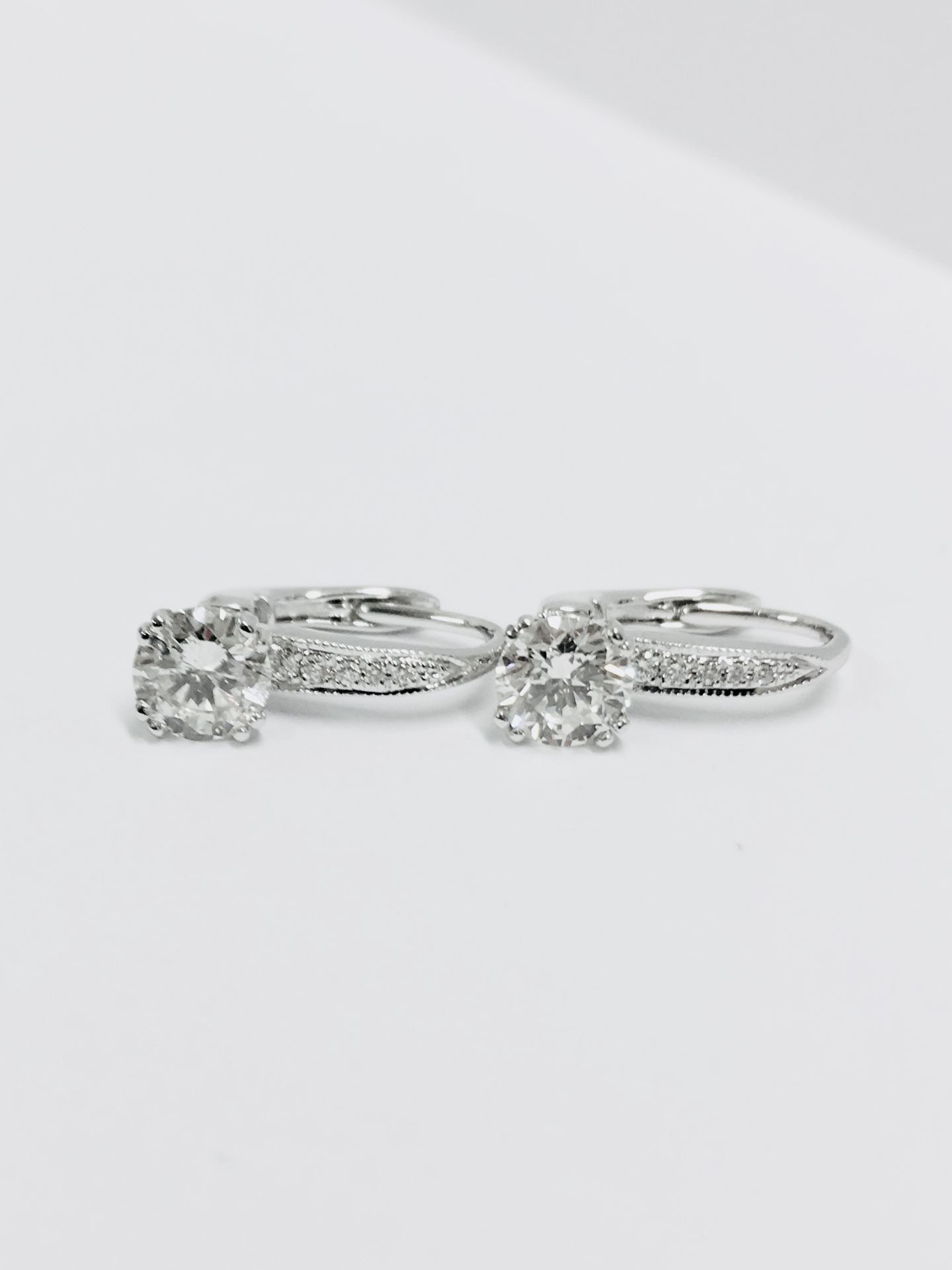 18ct white gold hoop style earrings with hinge fastners. 2 x 0.50ct Brilliant cut diamonds, i colour - Image 2 of 5
