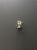 1.51ct diamond set solitaire ring set in platinum. Oval cut light yellow centre stone, VS1
