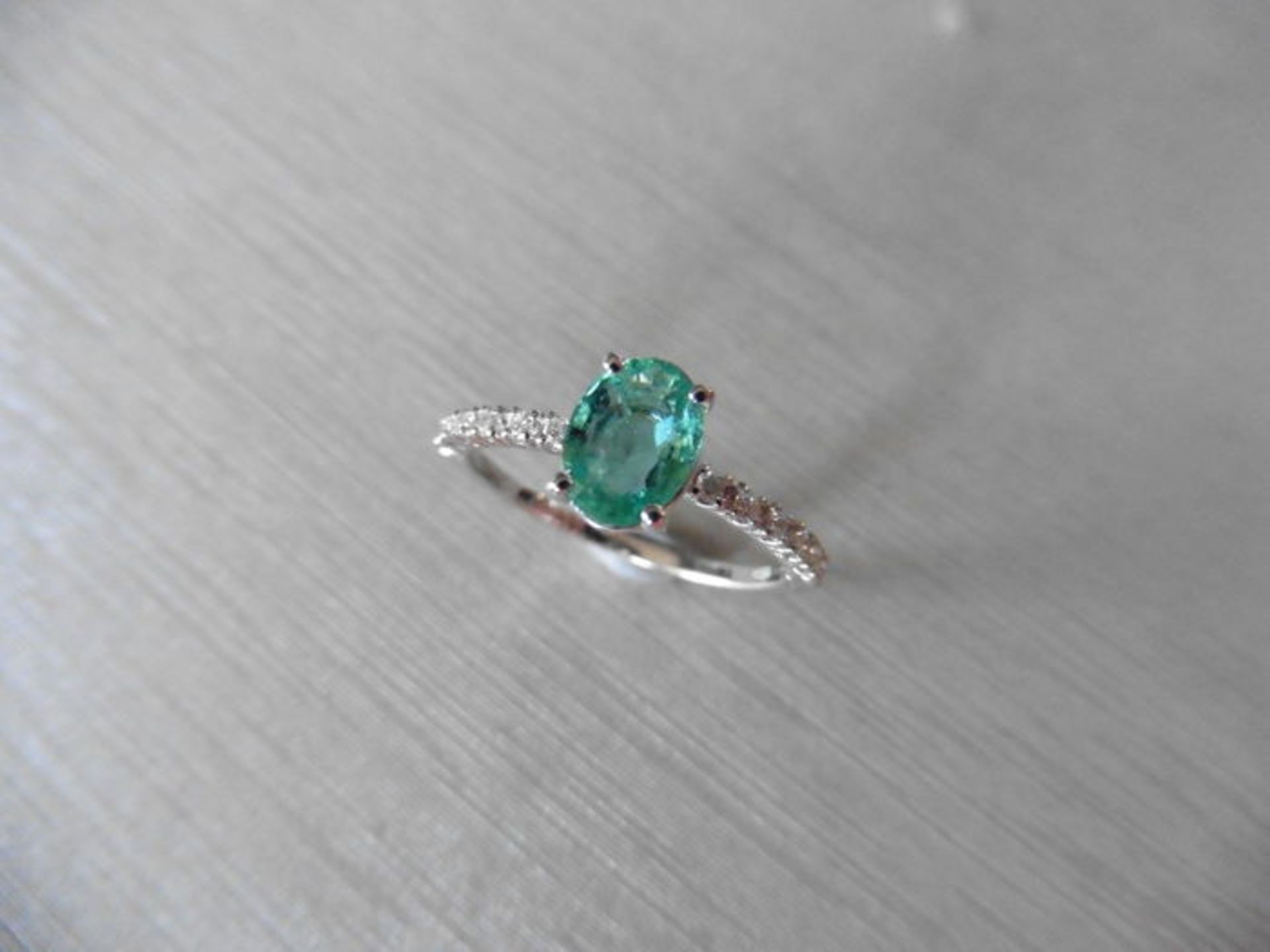 0.80ct / 0.12ct Emerald and diamond dress ring. Oval cut ( oil treated) emerald with small - Image 3 of 3