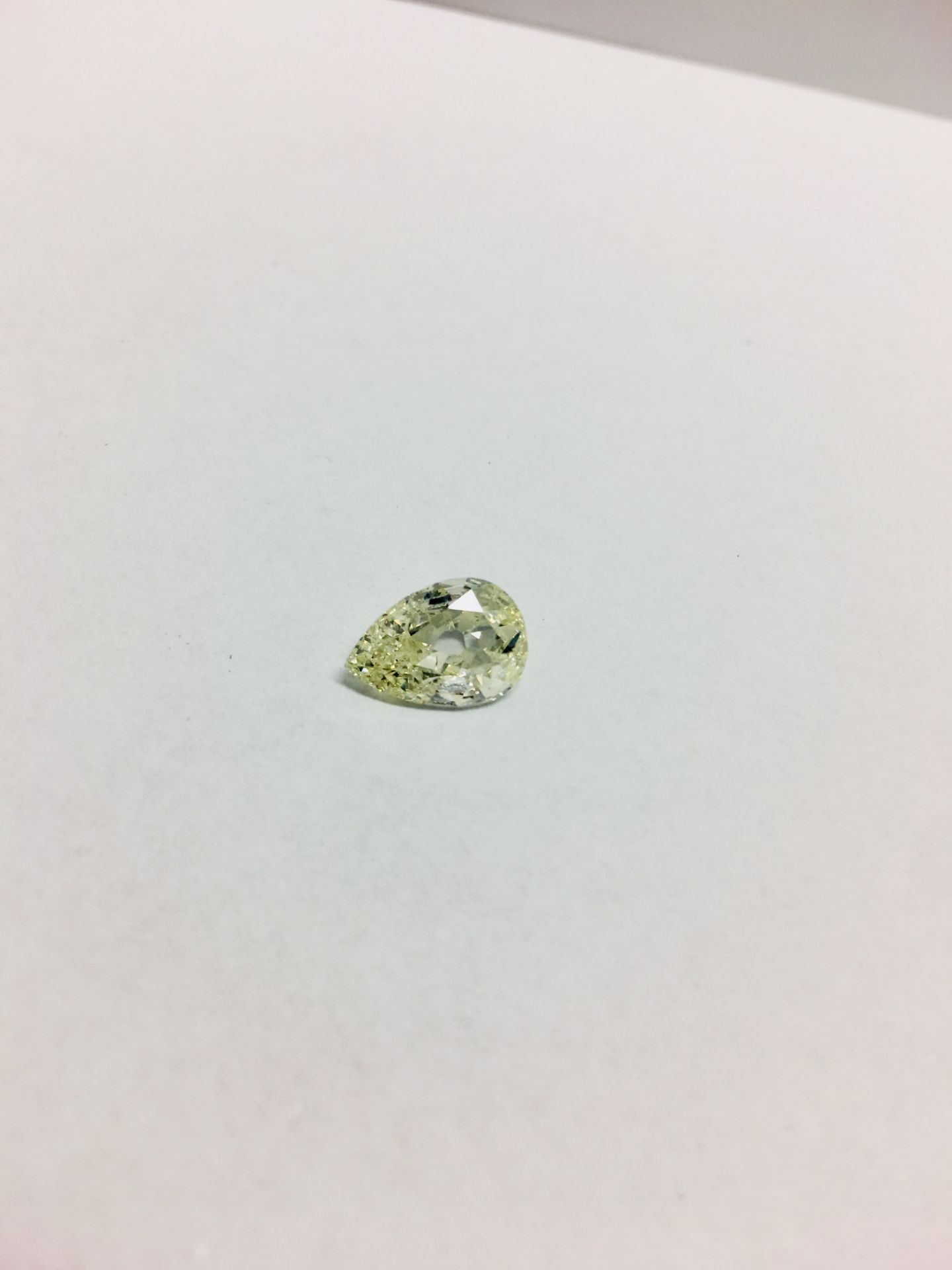 1.67ct Pearshape fancy yellow diamond,vs2 clarity ,appraisal