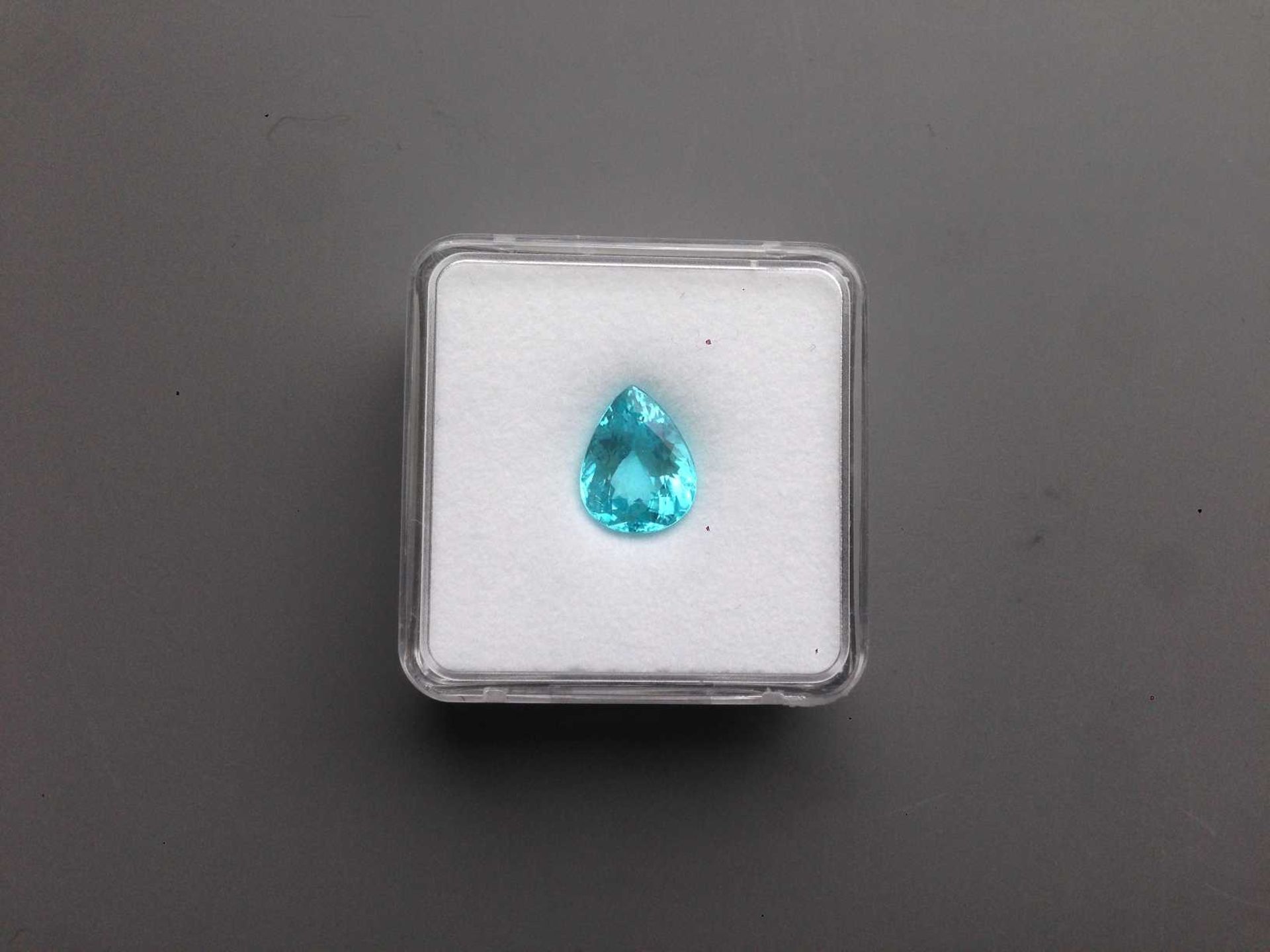 4.56CT PEARSAHPE PARAIBA TOURMALINE AIGS CERTIFICATION GIF16121924 APPRAISAL 22000 - Bild 2 aus 3