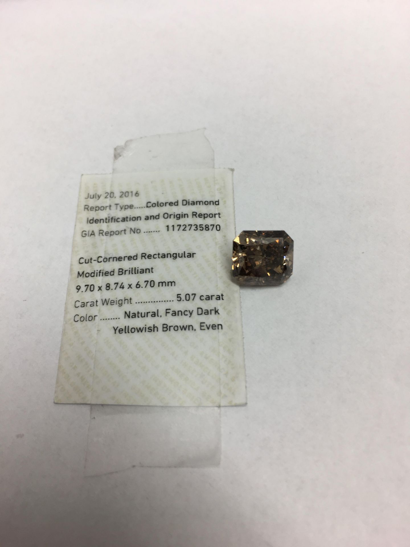 5.07 Natural dark yellow-brown cushion shape diamond,GIA certification 1172735870,appraisal 16000