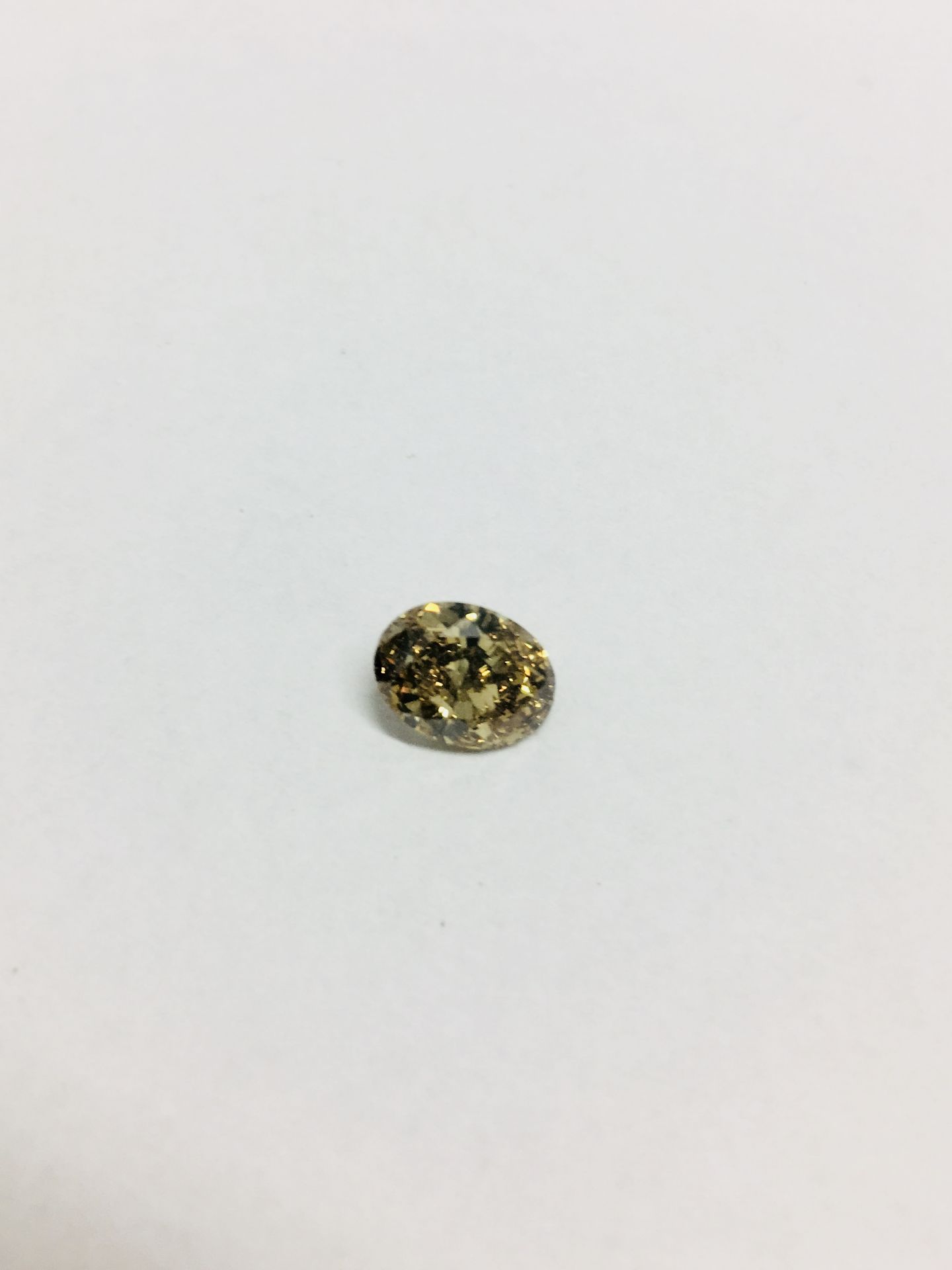 1.67ct Fancy oval diamond,vs2 clarity,fancydeep brown -yellow.hpht treated ,GIA certification