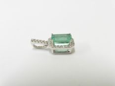 18ct white gold Emerald diamond pendant,1ct 7mm x5mm natural Emerald,102gms 18ct white gold ,27